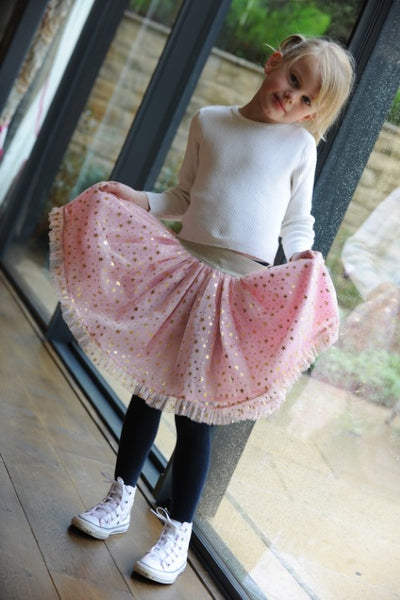 Pink skirt with gold stars